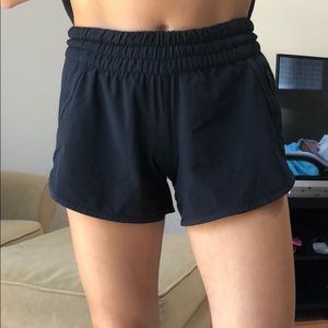 black lululemon tracker shorts